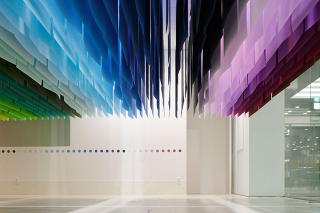 Illustration for article titled A Giant Paper Installation That Looks Like Sitting Inside a Rainbow
